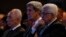 U.S. Secretary of State John Kerry (C) is joined by Israeli President Shimon Peres (L) and Palestinian President Mahmoud Abbas at the World Economic Forum on the Middle East and North Africa, May 26, 2013.