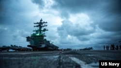 在南中国海执行例行任务的美国海军罗纳德.里根号（USS Ronald Reagan）航空母舰。（2021年6月14日）