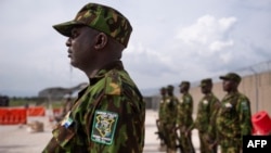 FILE - Kenyan members of the Multinational Security Support Mission (MSS) stand at attention in Port Au Prince, Haiti on Sept. 05, 2024.