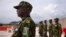 Kenyan members of the Multinational Security Support Mission (MSS) stand at attention as they wait the arrival of US Secretary of State Antony Blinken for a meeting at the base in Port Au Prince, Haiti on September 05, 2024.
