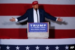 Republican presidential candidate Donald Trump speaks during a campaign rally in Boca Raton, Fla., Sunday, March 13, 2016.