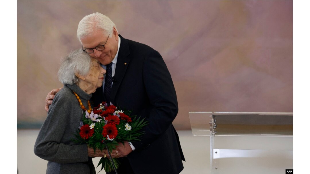 FILE - German President Frank-Walter Steinmeier hugs German Holocaust survivor Margot Friedlander as she arrives to take part in talks titled "War in the Middle East: For a peaceful life together in Germany" on November 8, 2023 at the presidential Bellevue Palace in Berlin.