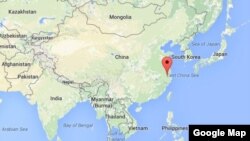 The red arrow shows Zhejiang province, China.