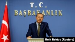 Revize edilmiş kabinesini açıklayan Başbakan Erdoğan