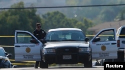 La police de San Diego sur les lieux où un policier a été tué et un autre blessé par balle pendant un contrôle routier, à San Diego, Californie, États-Unis, le 29 juillet 2016.