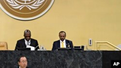 Under Secretary-General Tegegnework Gettu (right) and John Ashe, (left) the president of the 68th Session of the UN General Assembly, listen to Secretary-General Ban Ki-Moon’s address on January 28, 2013.