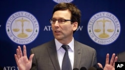 Washington State Attorney General Bob Ferguson speaks at a news conference about the state's response to President Trump's revised travel ban Thursday, March 9, 2017, in Seattle. 