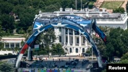 FILE PHOTO: Construction continues on a temporary arena that will host the UFC Freedom 250 fight card at the White House in Washington