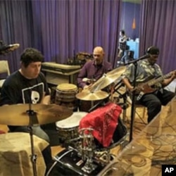 Students have recorded CDs with well-known bands like Taj Mahal