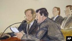 In this courtroom sketch, Joaquin "El Chapo" Guzman, foreground right, reads a statement through an interpreter during his sentencing in federal court, July 17, 2019, in New York.