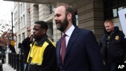 Rick Gates leaves federal court in Washington, Feb. 23, 2018. Gates is a former top adviser to President Donald Trump's election campaign.
