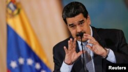 Presiden Venezuela Nicolas Maduro dalam konferensi pers di Caracas (30/9). 