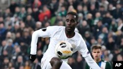 FILE - In this Nov. 28, 2019 file photo, Tokmac Nguen of Ferencvaros in action during the soccer Europa League Group H fifth round soccer match Ferencvaros vs. Espanyol at the Groupama Arena in Budapest, Hungary.