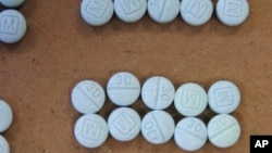 This undated photo shows fentanyl pills. The powerful painkiller has been identified as the drug that killed the superstar Prince.
