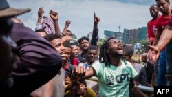 FILE - People protest the killing of more than 20 people and the displacement of residents in Burayu town, at Meskel Square in Addis Ababa, Ethiopia, Sept. 17, 2018.