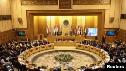 FILE - Arab League foreign ministers hold an emergency meeting on U.S. President Donald Trump's decision to recognize Jerusalem as the capital of Israel, in Cairo, Egypt, Dec. 9, 2017. 