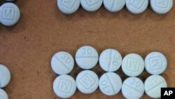 FILE - This undated photo shows fentanyl pills.