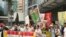 香港政党团体游行至候任特首办递交联署信 美国之音海彦拍摄