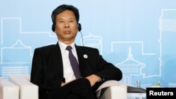 中国财政部长刘昆2018年5月28日在上海出席新开发银行（又称金砖国家开发银行）第三届年会。