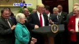 VOA60 America - President Donald Trump outlines his new tax proposal