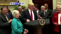 VOA60 America - President Donald Trump outlines his new tax proposal