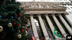 FILE - A giant Christmas tree stands outside the New York Stock Exchange, in New York, Nov. 30, 2021.