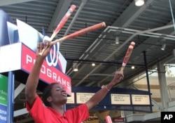 Vendor sells Strasburg memorabilia at Nationals Park in Washington