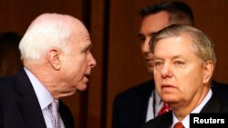 U.S. Senator. John McCain and U.S. Senator Lindsey Graham shown on Capitol Hill in Washington, June 4, 2013. 