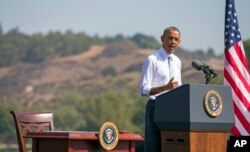 FILE - President Barack Obama speaks at Frank G. Bonelli Regional Park in San Dimas, Calif., as he designated the nearly 350,000 acres within the San Gabriel Mountains northeast of Los Angeles a national monument, Oct. 20, 2014.