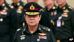 Thai new Prime Minister Prayuth Chan–ocha arrives to attend an establishment anniversary of the 21st Infantry Regiment, Queen's Guard in Chonburi Province ,Thailand, Aug. 21, 2014. 