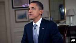 US President Barack Obama records the weekly speech, 10 Dec 2010