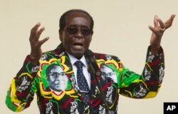 FILE - Zimbabwean President Robert Mugabe at an event before the closure of his party's 16th Annual Peoples Conference in Masvingo, south of Harare.