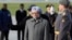 India's Prime Minister Manmohan Singh (front) takes part in a welcoming ceremony next to an honour guard upon his arrival at Moscow's Vnukovo airport, Oct. 20, 2013.