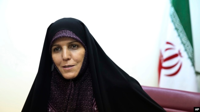FILE - Then-Vice President for Women and Family Affairs Shahindokht Molaverdi speaks in an interview with The Associated Press at her office in Tehran, Iran, June 8, 2015.