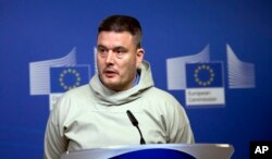 FILE - Greenland's Prime Minister Kim Kielsen speaks during a media conference at EU headquarters in Brussels, March. 19, 2015.