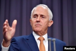 FILE - Australian PM Malcolm Turnbull comments on a deal with the United States accepting refugees from Australia at Parliament House in Canberra, Jan. 30, 2017.