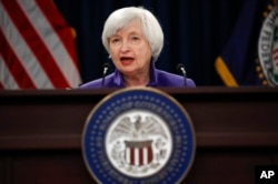 FILE - Then-Federal Reserve Chair Janet Yellen speaks during a news conference in Washington, Dec. 13, 2017.