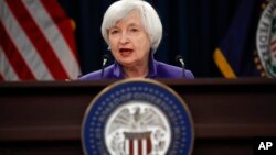FILE - Federal Reserve Chair Janet Yellen speaks during a news conference following the Federal Open Market Committee meeting in Washington, Dec. 13, 2017. 