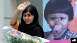 Malala Yousafzai, the 16-year-old girl from Pakistan who was shot in the head by the Taliban last October for advocating education for girls, waves as she leaves the stage after speaking about her fight for girls' education on the International Day of the