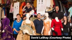 Stephen Cabral (upper right) and TDF staff pose with some of their favorite costumes.