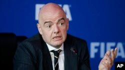 FILE - FIFA President Gianni Infantino speaks during a news conference after the FIFA council meeting, in Bogota, Colombia, March, 16, 2018.