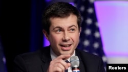 FILE - Pete Buttigieg, mayor of South Bend, Ind., and a candidate for Democratic National Committee chairman, speaks during a Democratic National Committee forum in Baltimore, Md., Feb. 11, 2017.