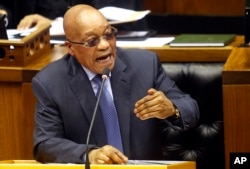 FILE - South African President Jacob Zuma answers questions in parliament in Cape Town, March 17, 2016.