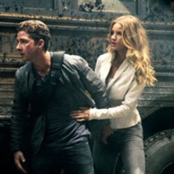 Shia LaBeouf plays Sam Witwicky, left, and Rosie Huntington-Whiteley plays Carly Miller in a scene from "Transformers: Dark of the Moon"