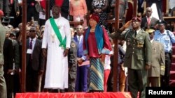 Liberia's former President Ellen Johnson Sirleaf and the new President-elect George Weah are seen during his swearing-in ceremony at Samuel Kanyon Doe Sports Complex in Monrovia, Liberia, Jan. 22, 2018. 