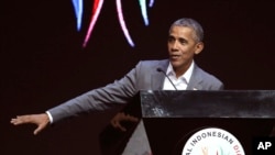 Former U.S. President Barack Obama gestures as he delivers his speech during the 4th Congress of the Indonesian Diaspora Network in Jakarta, Indonesia, Saturday, July 1, 2017.