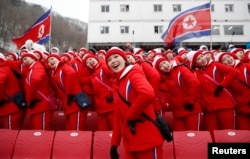 North Korean cheerleaders at a downhill skiing event at the Pyeongchang 2018 Winter Olympics on February 14, 2018.