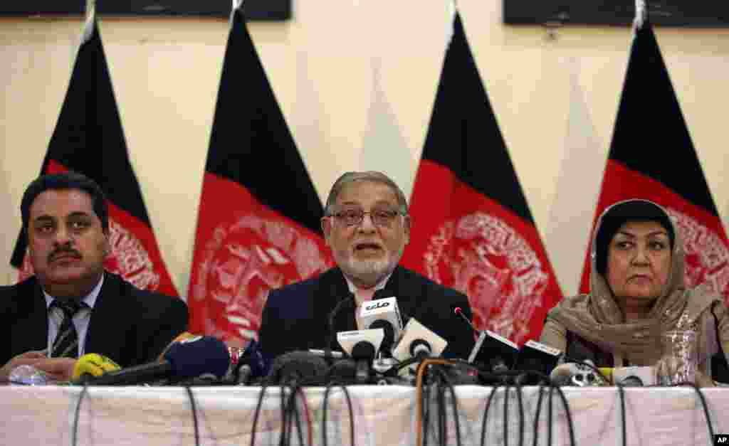 Ahmad Yousuf Nouristani speaks during a press conference in Kabul, Afghanistan, Sept. 21, 2014.