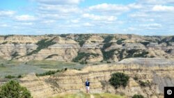 Mikah Meyer takes in the view at Theodore Roosevelt National Park in North Dakota