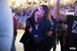 Beto O’Rourke supporters cry and hug each other during Beto O’Rourke concession speech on Tuesday night, Nov. 6, 2018, after midterm election results.